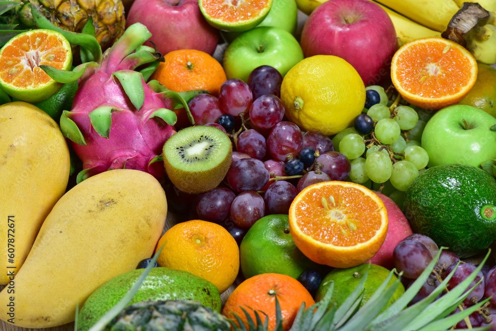 assorted fruits, top view healthy food concept Including high vitamin fruits, fresh fruits, thai fruits assorted fruits, top view healthy food concept Including high vitamin fruits, fresh fruits, thai fruits