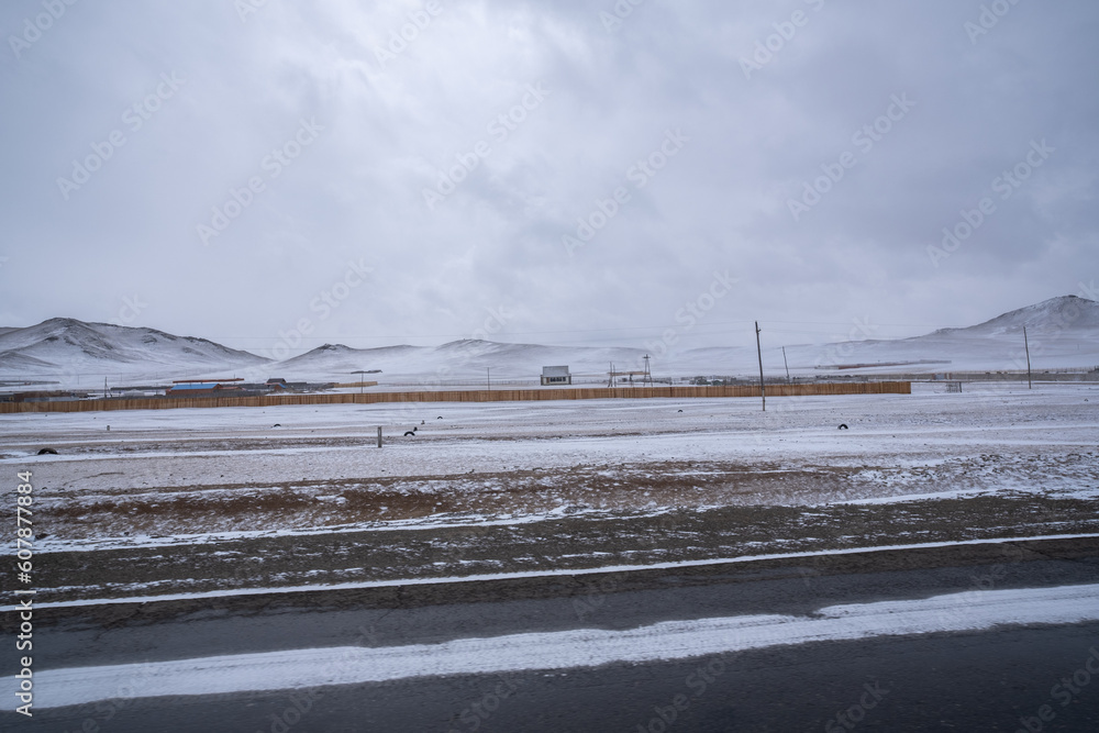 Snow covered the highway road in winter, Mongolia