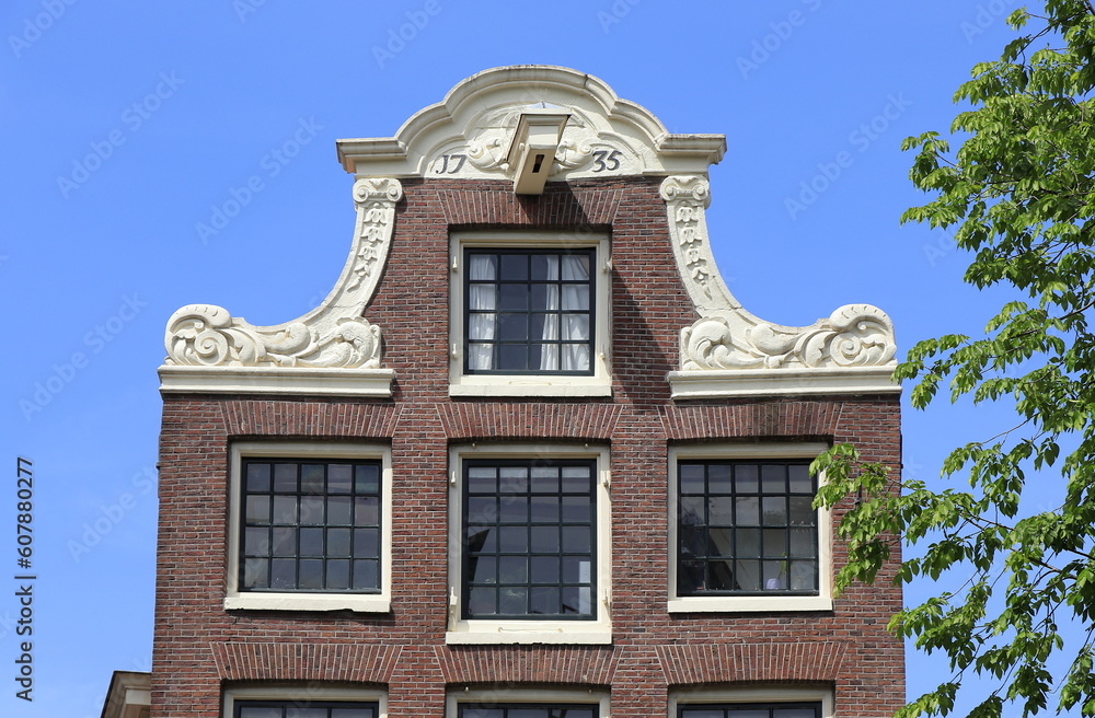 Amsterdam Oudezijds Voorburgwal Canal Bell Gable with 1735 Inscription Close Up, Netherlands