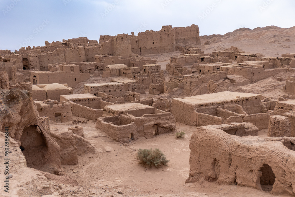 ancient medieval ruins of a city from clay and mud in iran desert