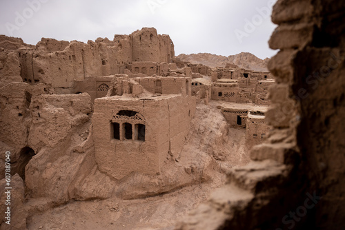 ancient medieval ruins of a city from clay and mud in iran desert fort