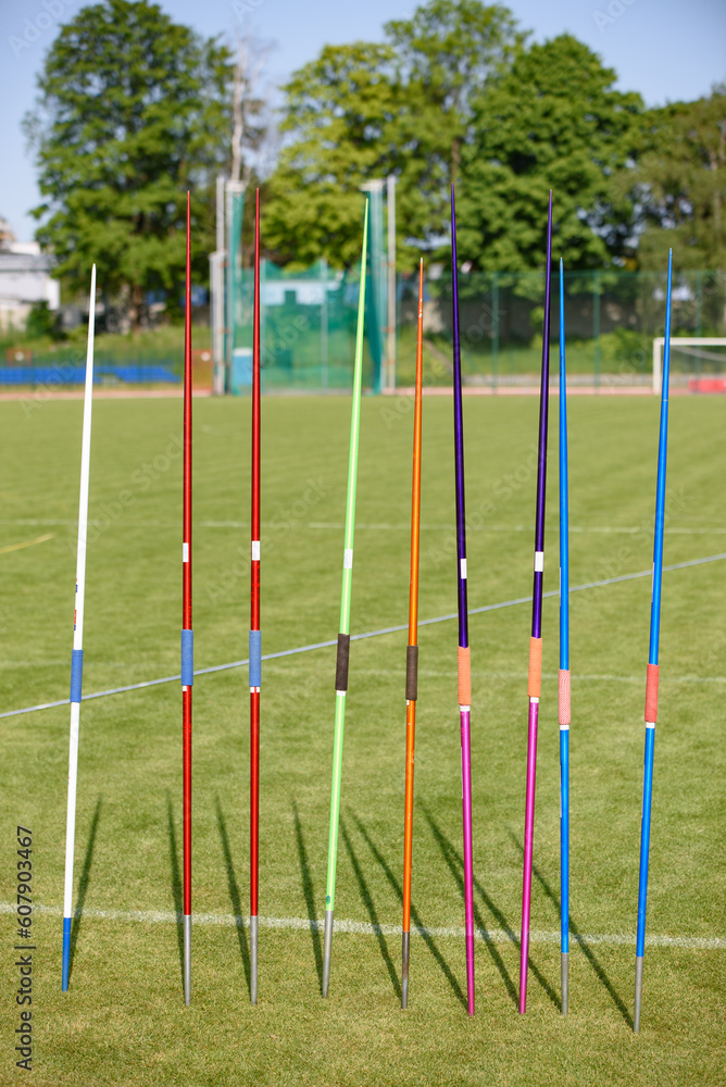 Javelins stuck in the ground during a competition Javelins stuck in the ground during a competition