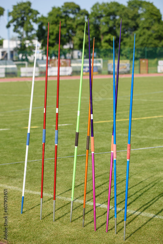 Javelins stuck in the ground during a competition