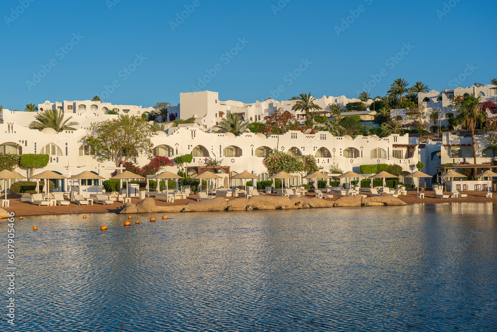 Calm beach on the red sea of Sharm El Sheikh during sunrise, Egypt