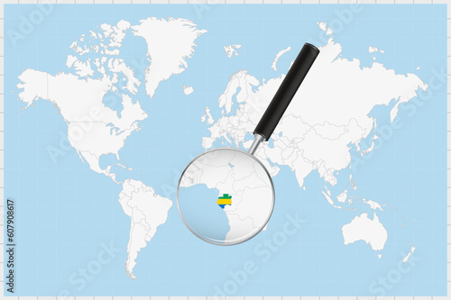 Magnifying glass showing a map of Gabon on a world map.