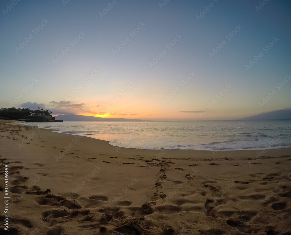 Beautiful view of the sunset at the beach in Maui, Hawaii Beautiful view of the sunset at the beach in Maui, Hawaii