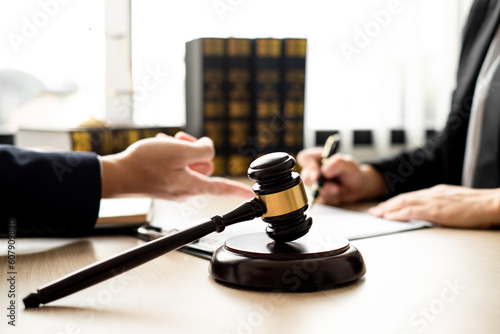 The lawyer and client discuss the lawsuit, analyze facts, explore legal options, and plan their strategy together.
