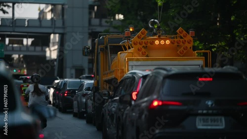 The transportation of cars and motorcycles in the big city has a lot of  pollution.