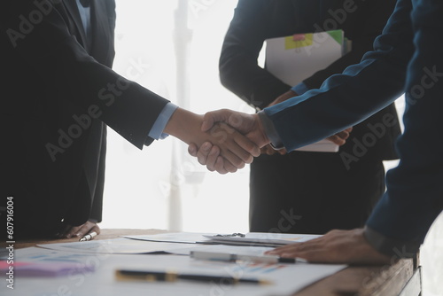 Wallpaper Mural Business handshake for teamwork of business merger and acquisition,successful negotiate,hand shake,two businessman shake hand with partner to celebration partnership and business deal concept Torontodigital.ca