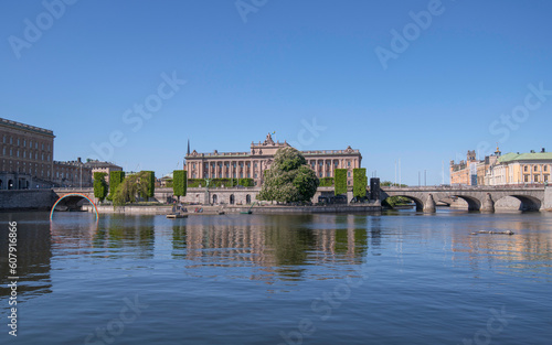 The parliament house and government buildings at the bay Strömmen, a sunny summer day in Stockholm