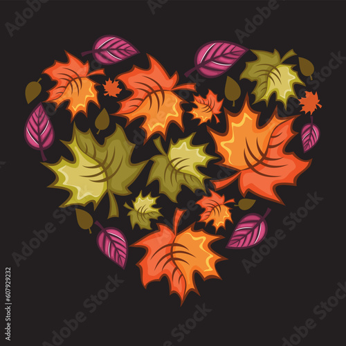 Different types of autumnal leafs combined in a shape of a heart. On black background.