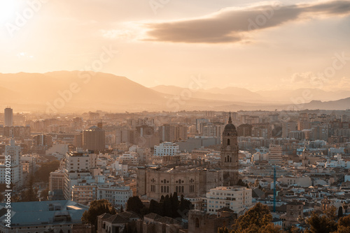 panoramic view of ancient spanish city Malaga, sunset, Andalusia, Spain