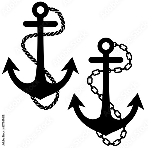 Set of anchors surrounded by rope and chains.