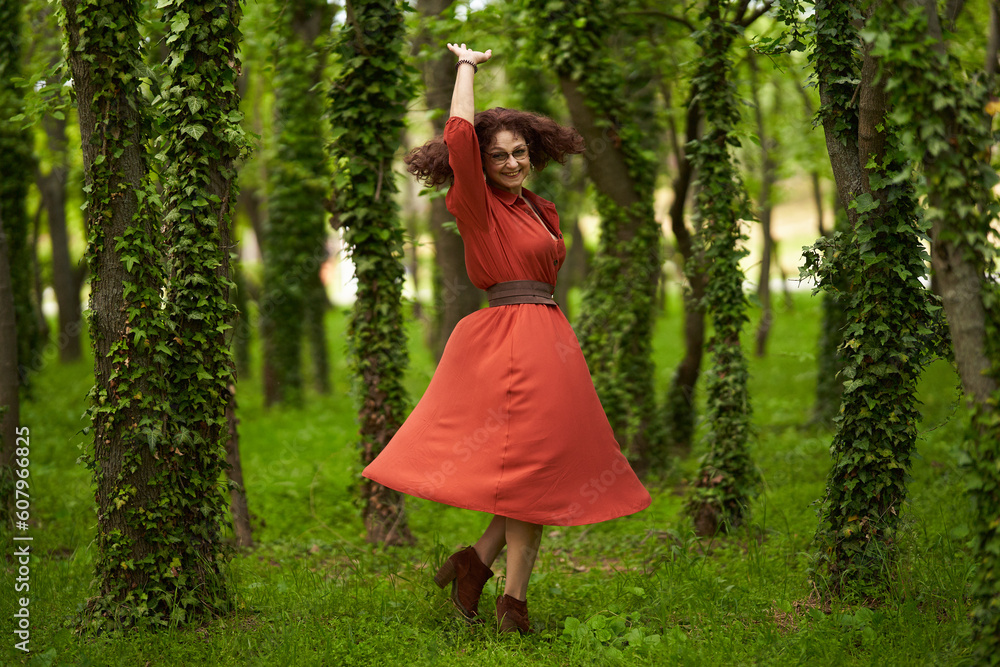 Candid of a mature curly hair redhead woman Candid of a mature curly hair redhead woman