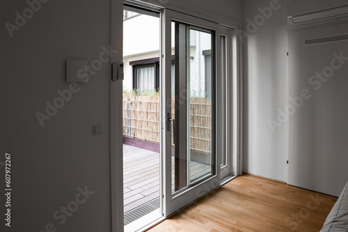 Big glass door in light room