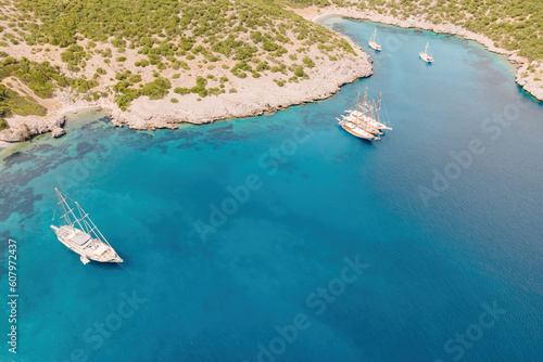 Aerial view of Akvaryum koyu lagoon and yachts. Landscape of turkish riviera nature