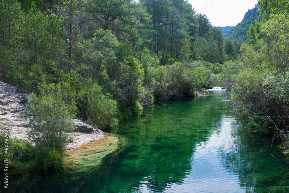 Peaceful landscape with river and green forest. Peralejos de las Truchas. Peaceful landscape with river and green forest. Peralejos de las Truchas.