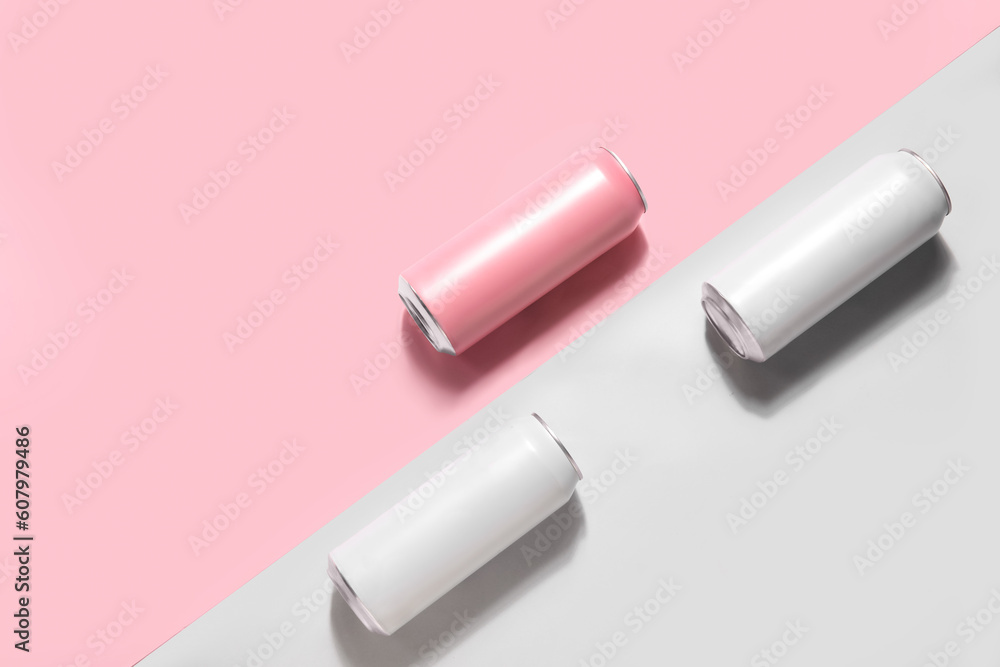 Metal cans of fresh soda on color background Metal cans of fresh soda on color background