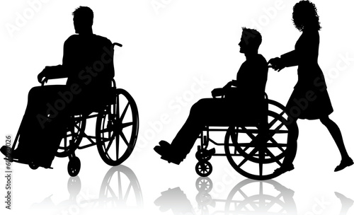 Silhouette of a man in a wheelchair and one with a woman pushing him