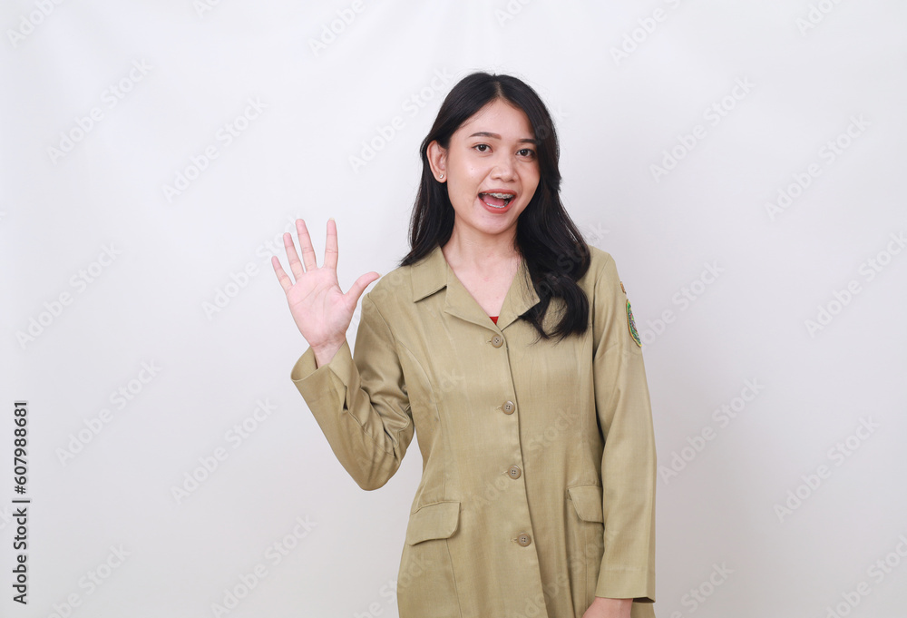 Attractive Young government worker showing five fingers Attractive Young government worker showing five fingers