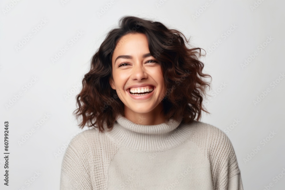 Medium shot portrait photography of a grinning woman in her 30s that is wearing a cozy sweater against a white background . Generative AI Medium shot portrait photography of a grinning woman in her 30s that is wearing a cozy sweater against a white background . Generative AI