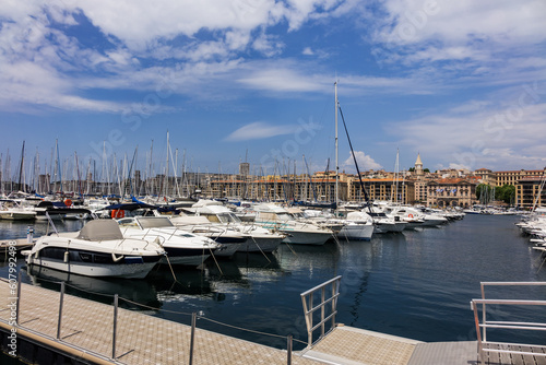 Old Port (Vieux-Port de Marseille) with several boats moored in the marina of Marseille. MARSEILLE, FRANCE. May 29, 2023. © dbrnjhrj