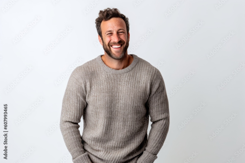 Portrait of a handsome young man laughing with hand on hip. Portrait of a handsome young man laughing with hand on hip.