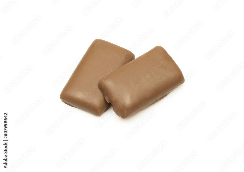 Small pieces of chocolate isolated on white background. Pair of choco bar candy dessert Small pieces of chocolate isolated on white background. Pair of choco bar candy dessert