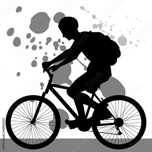 An image of a teenager riding a bicycle.