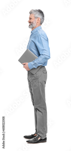 Mature businessman in stylish clothes with laptop on white background