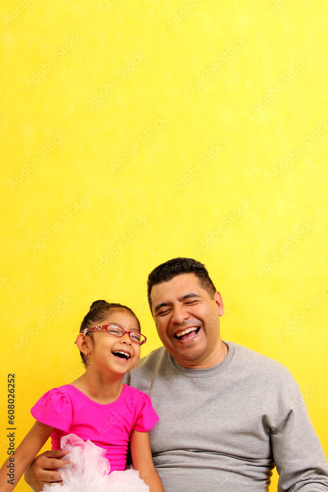 Divorced single brown dad carries his Latina daughter on his legs dressed as a ballerina, they play and show their love Divorced single brown dad carries his Latina daughter on his legs dressed as a ballerina, they play and show their love