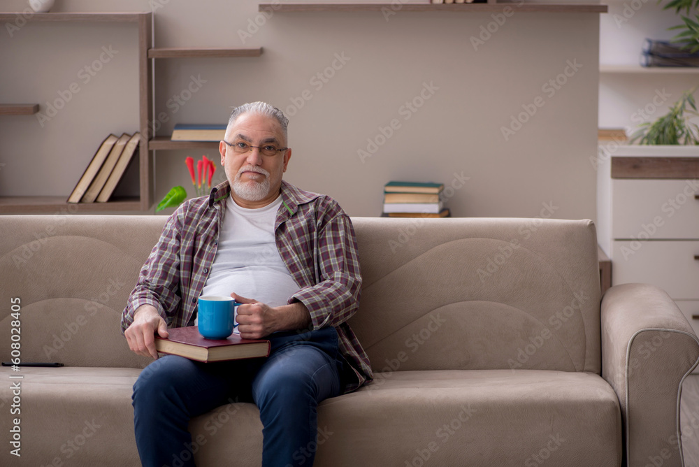 Old man sitting at home Old man sitting at home