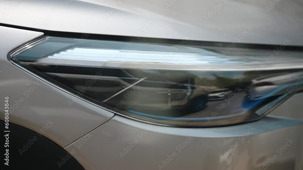 The modern headlights or front light of the automobile car in the capital city.
The modern headlights or front light of the automobile car in the capital city.