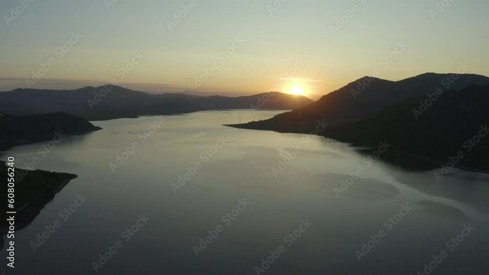 Colorful and dreamy aerial of a lake in the mountains at sunrise in Basilicata, Lake of Acerenza, Italy 4K drone Colorful and dreamy aerial of a lake in the mountains at sunrise in Basilicata, Lake of Acerenza, Italy 4K drone