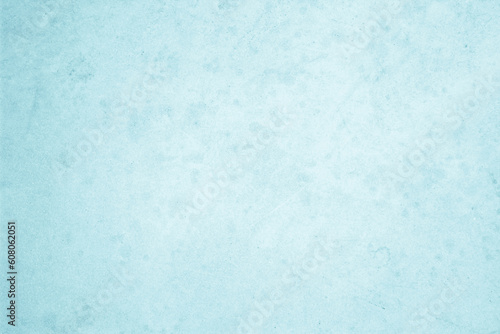 Blue light concrete texture for background in summer wallpaper. Cyan cement color sand wall of tone vintage. Abstract teal dark.  © Phokin