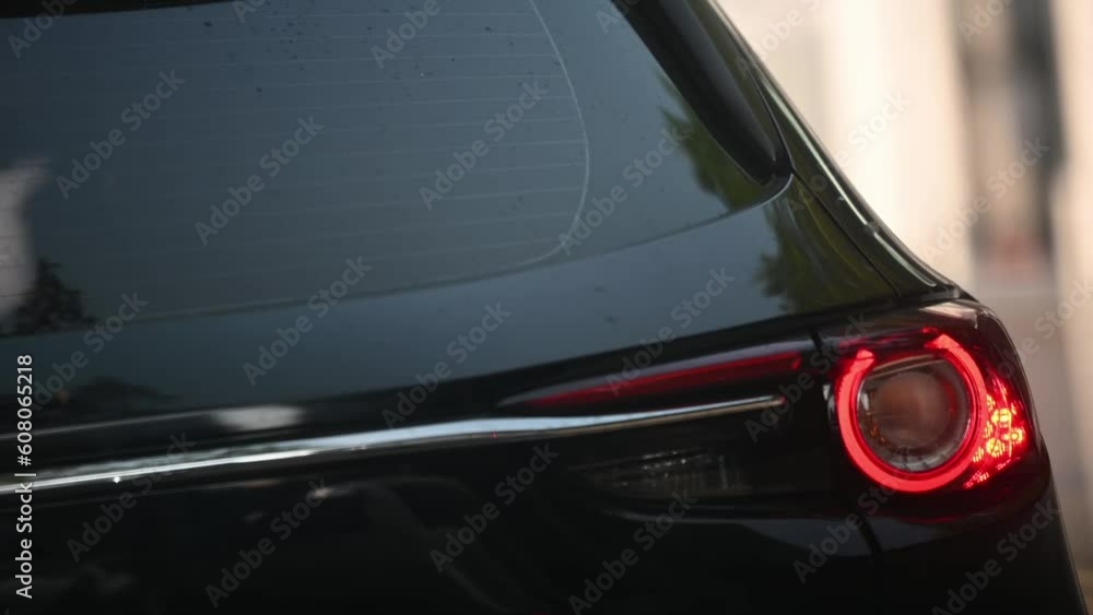 The modern Rear light or backlight body parts of the automobile car in the capital city. The modern Rear light or backlight body parts of the automobile car in the capital city.