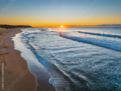 Aerial sunrise seascape with clear skies © Merrillie