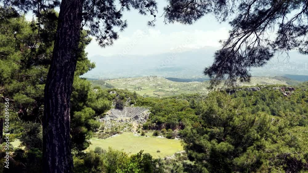 Overlooking Pinara landscape and ancient amphitheatre ruin Lycian archaeology Overlooking Pinara landscape and ancient amphitheatre ruin Lycian archaeology