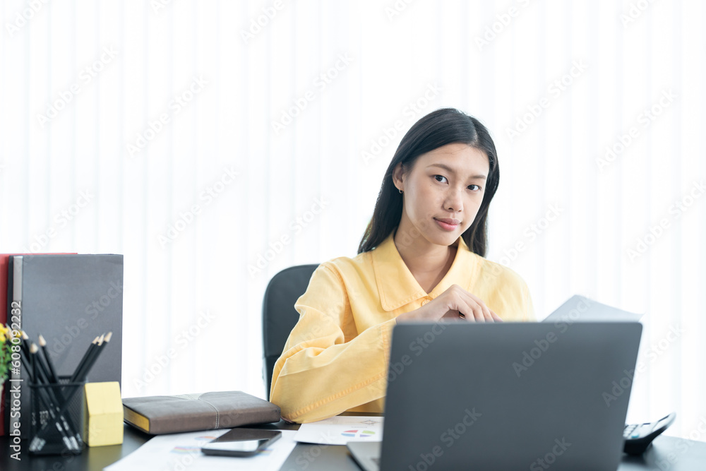 business woman using laptop or notebook computer with data analysis graph dashboard, confident woman working with computer laptop concept, contact idea design dashboard graph business conceptual. business woman using laptop or notebook computer with data analysis graph dashboard, confident woman working with computer laptop concept, contact idea design dashboard graph business conceptual.