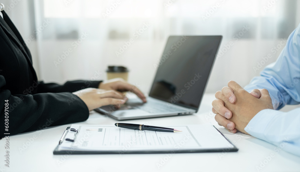 HR Manager talks to job applicants for job interviews about careers and Her personal history in the company. Employment and Recruitment concepts HR Manager talks to job applicants for job interviews about careers and Her personal history in the company. Employment and Recruitment concepts