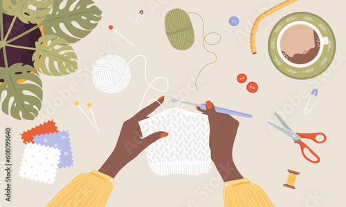 Crochet knitting process. African female hands with hook and thread. Balls of yarn. Top view of the workplace. Tailor shop elements. Hand drawn vector illustration in flat cartoon style.