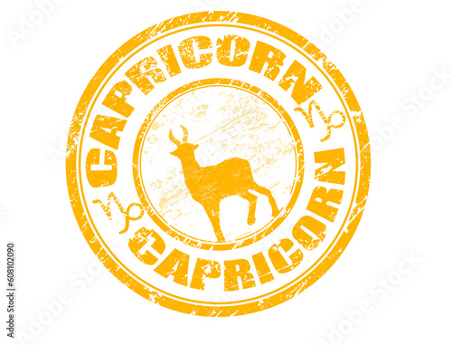 Yellow grunge rubber stamp with capricorn shape and the capricorn zodiac symbol