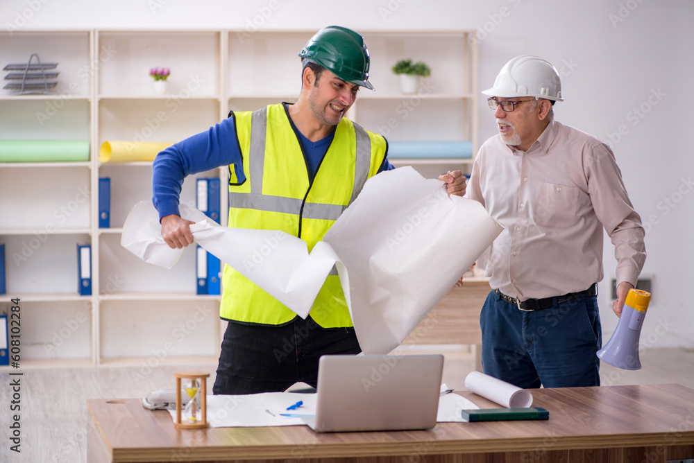 Two male architects working on the project Two male architects working on the project