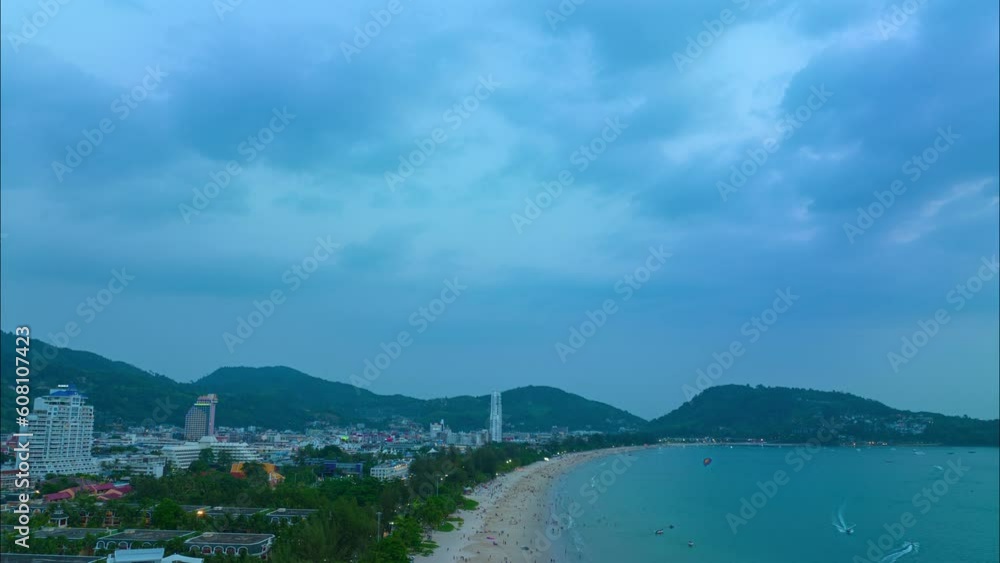 aerial Hyperlapse view cloud in blue sky at Patong beach Phuket Thailand..Patong Beach used to be one of the top tourist destinations in the world..white sand beach green sea smoot waves background aerial Hyperlapse view cloud in blue sky at Patong beach Phuket Thailand..Patong Beach used to be one of the top tourist destinations in the world..white sand beach green sea smoot waves background
