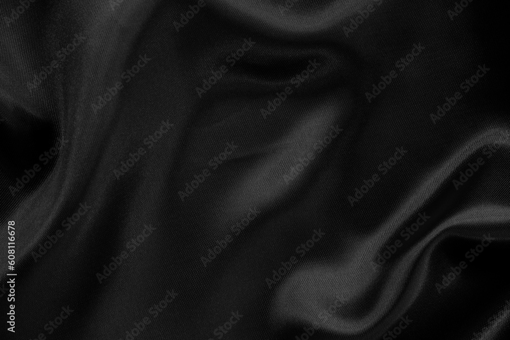 Black grey fabric texture background, detail of silk or linen pattern. Black grey fabric texture background, detail of silk or linen pattern.