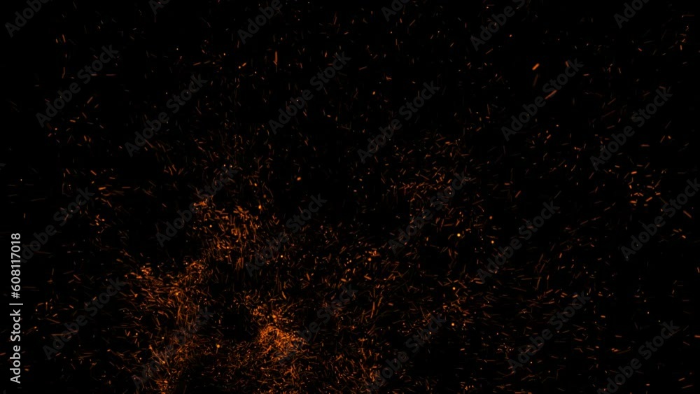 The sweltering bonfire made sparks. fire particles on black background The sweltering bonfire made sparks. fire particles on black background