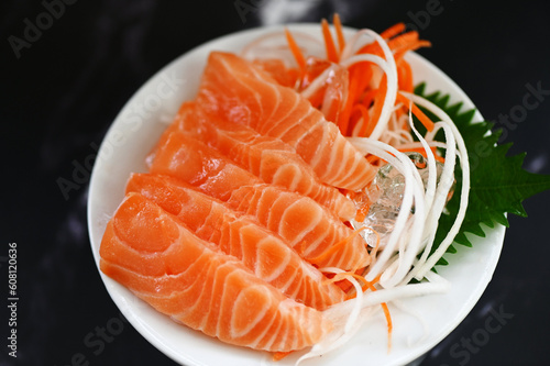 salmon sashimi food salmon fillet japanese menu with shiso perilla leaf lemon herb and spices, fresh raw salmon fish for cooking food seafood salmon fish
