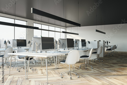 Clean coworking office interior with furniture, equipment and panoramic window with city view and daylight. 3D Rendering. © Who is Danny