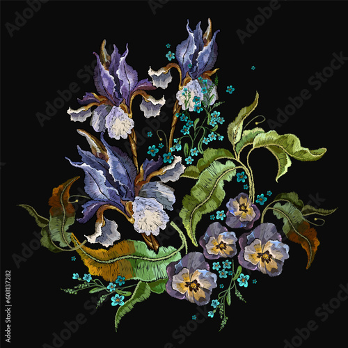Embroidery beautiful blue spring irises, meadow herbs and violet flowers. Fashion art template for clothes, t-shirt design. Summer floral garden style