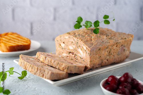 Chicken terrine. Chicken meat pate with fresh parsley